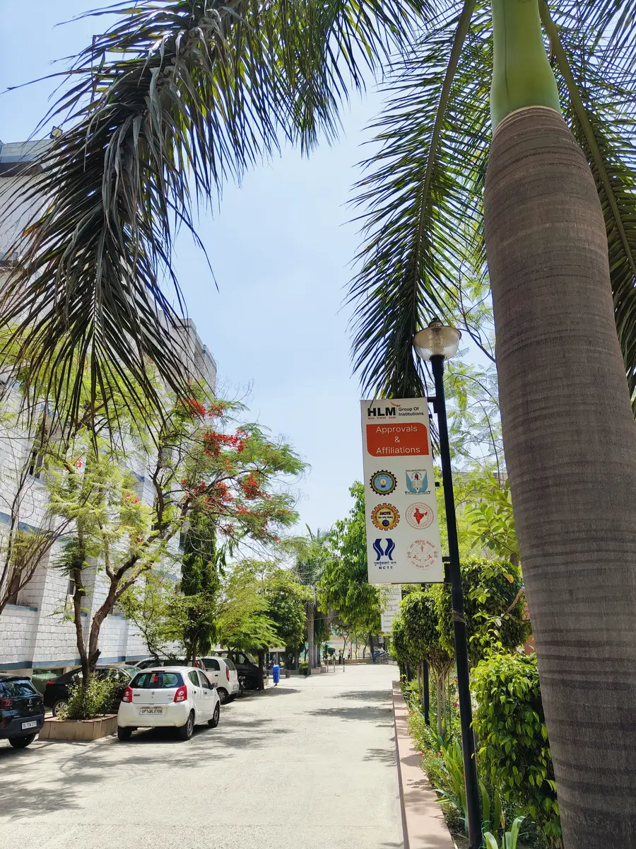 The tree-lined walkway through the HLM campus at Ghaziabad